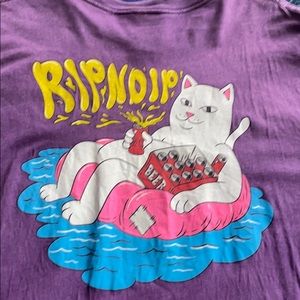Gently used purple RipnDip River float tee